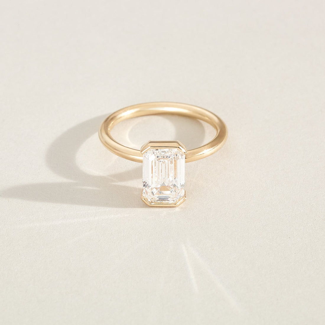 Evie | Emerald Half Bezel Solitaire Lab-Grown Diamond Engagement Ring