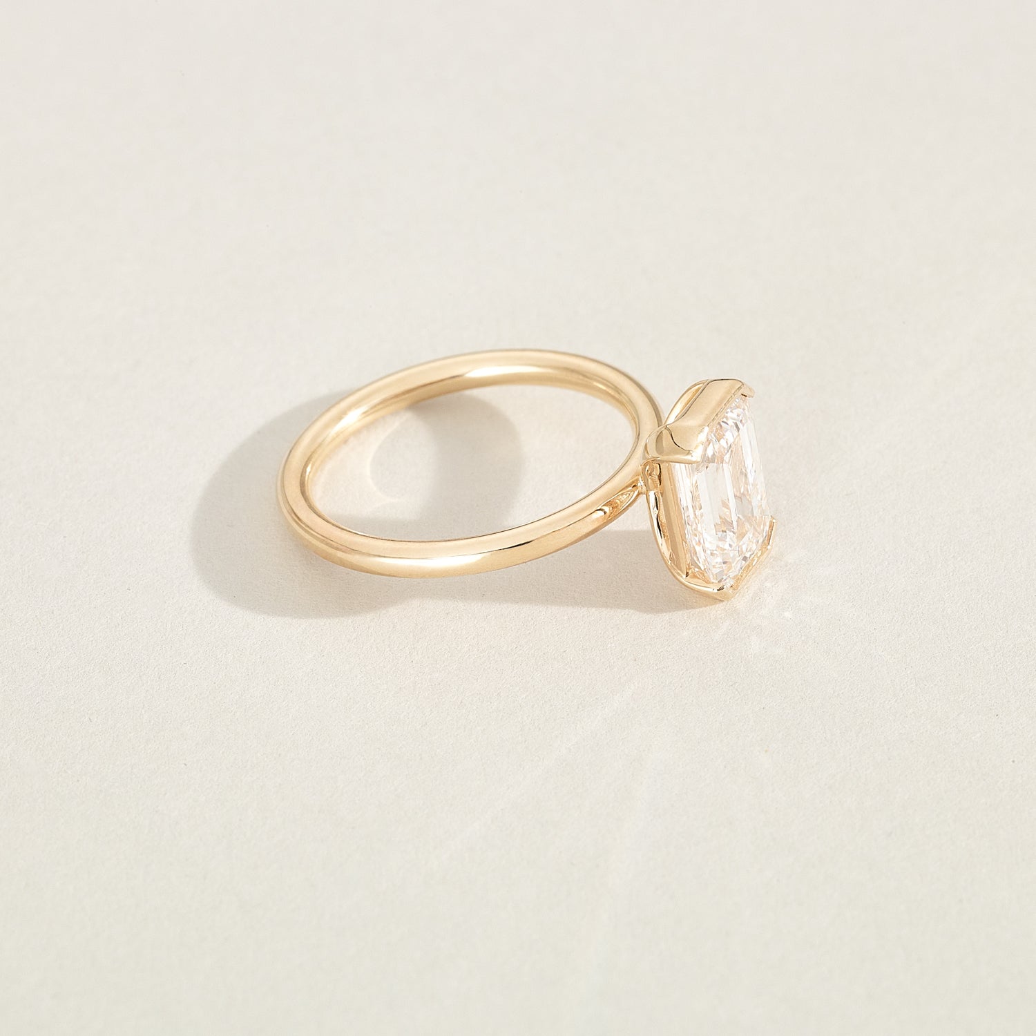 Evie | Emerald Half Bezel Solitaire Lab-Grown Diamond Engagement Ring