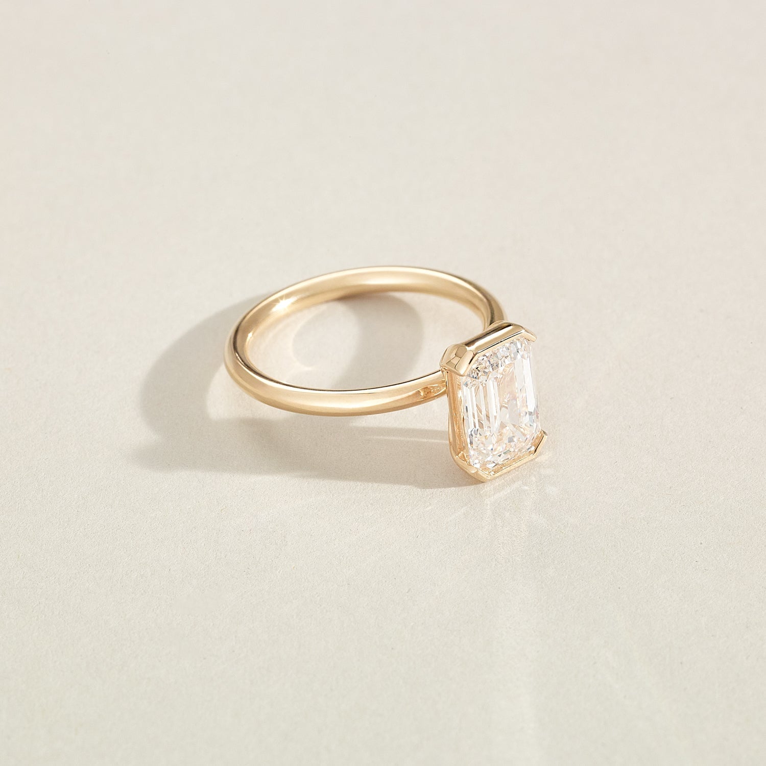 Evie | Emerald Half Bezel Solitaire Lab-Grown Diamond Engagement Ring