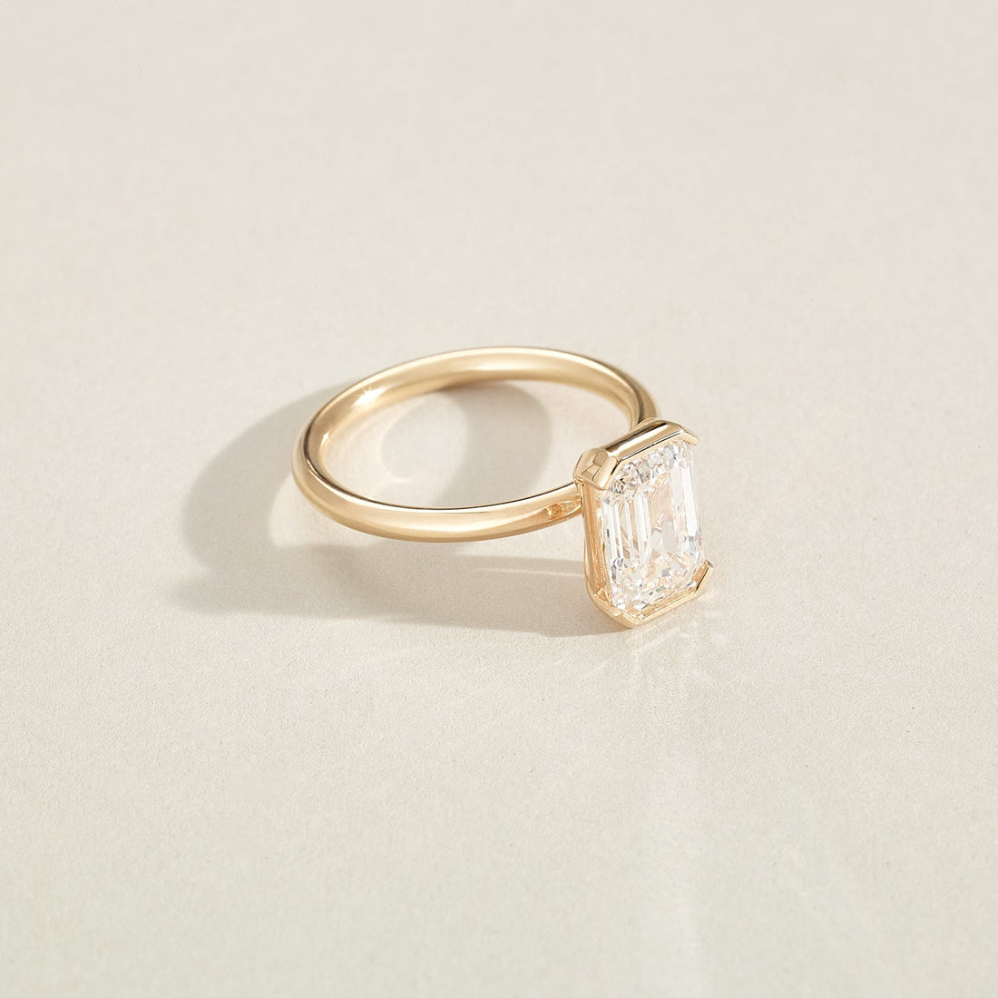 Evie | Emerald Half Bezel Solitaire Lab-Grown Diamond Engagement Ring