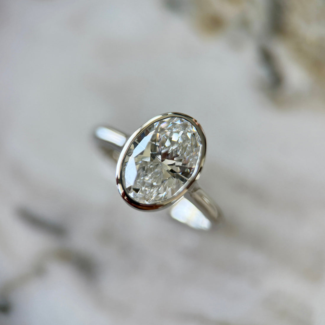 Bezel Set Classic Oval Cut Solitaire - 2ct+ (10mm+, D/E & VVS)