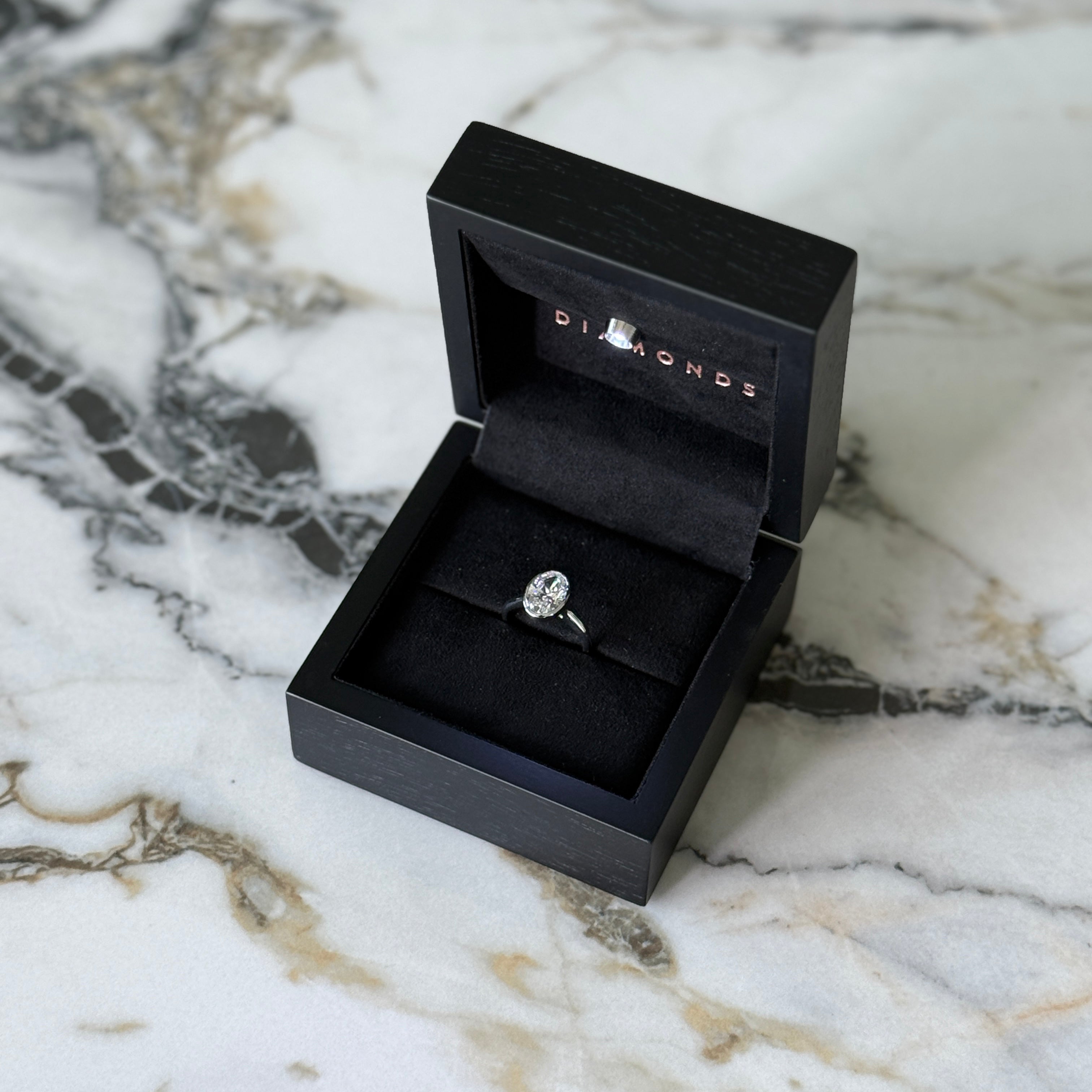 Bezel Set Classic Oval Cut Solitaire - 2ct+ (10mm+, D/E & VVS)