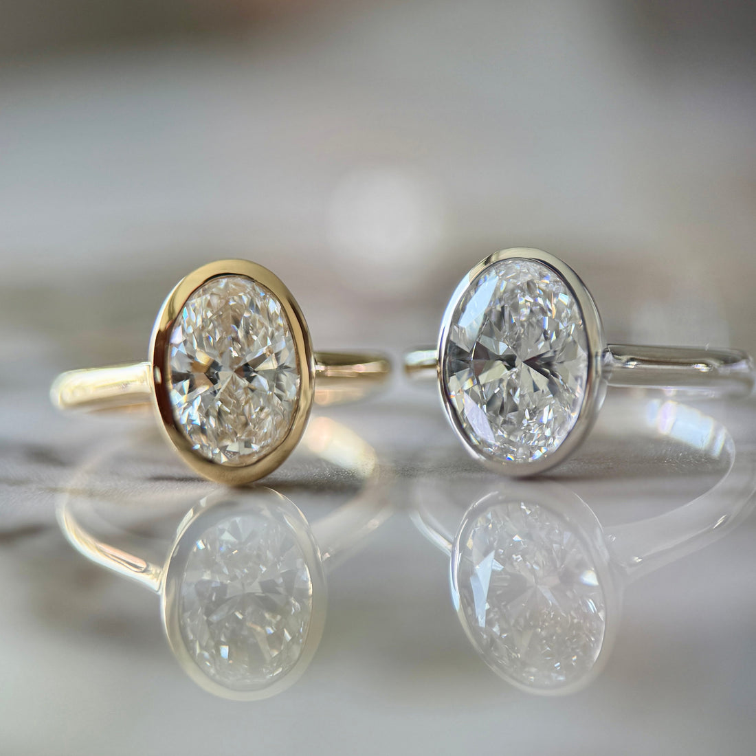 Bezel Set Classic Oval Cut Solitaire - 2ct+ (10mm+, D/E & VVS)