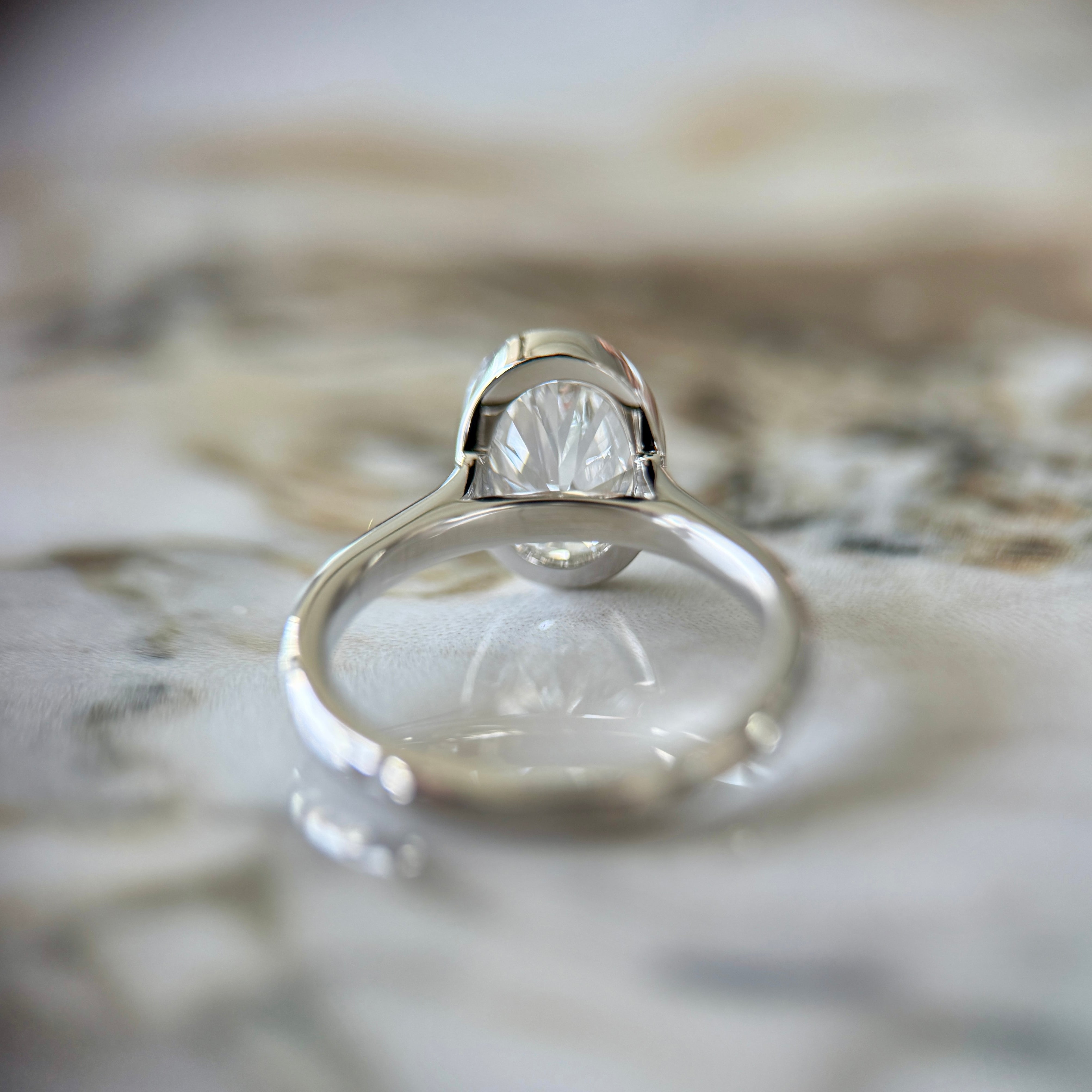 Bezel Set Classic Oval Cut Solitaire - 2ct+ (10mm+, D/E & VVS)