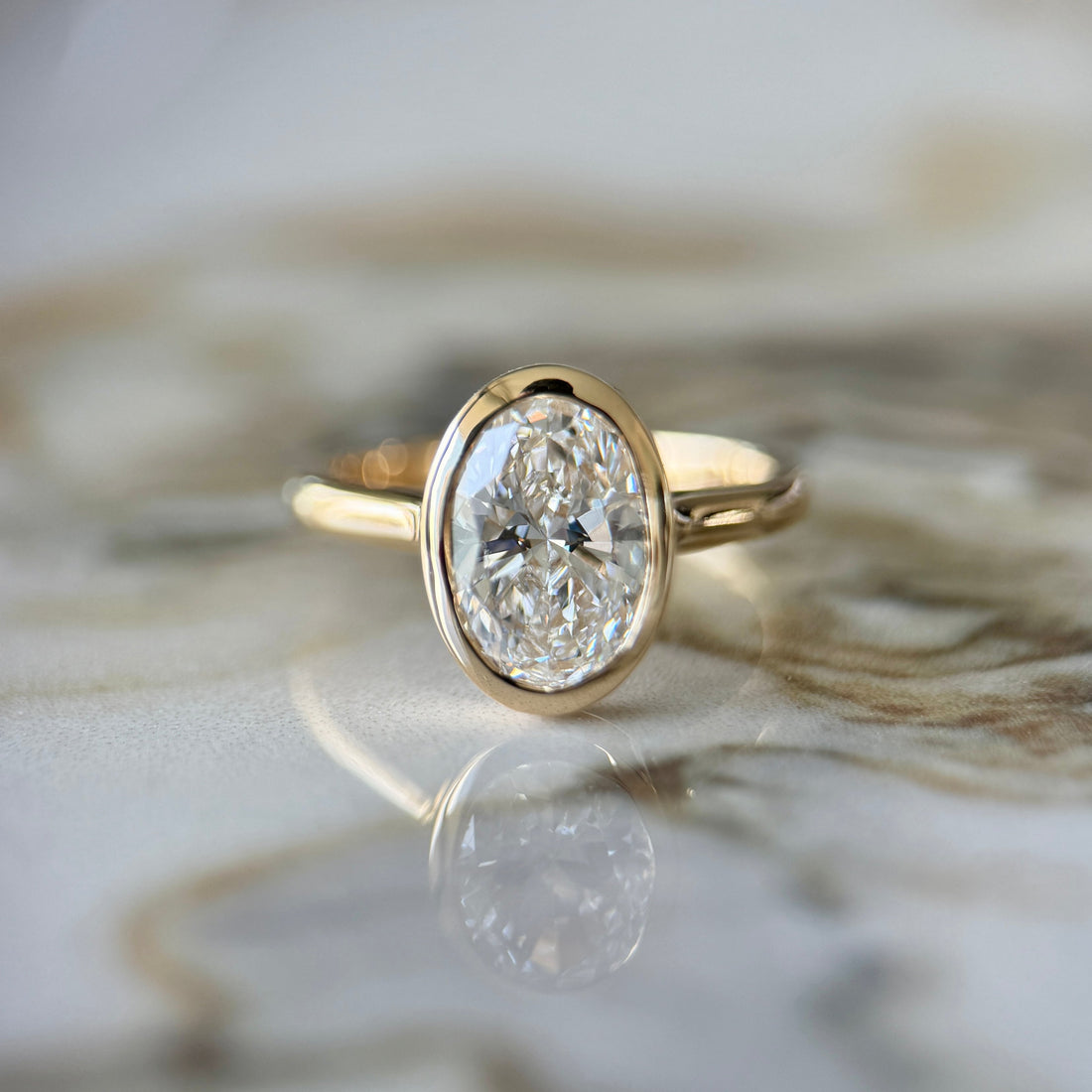 Bezel Set Classic Oval Cut Solitaire - 2ct+ (10mm+, D/E & VVS)