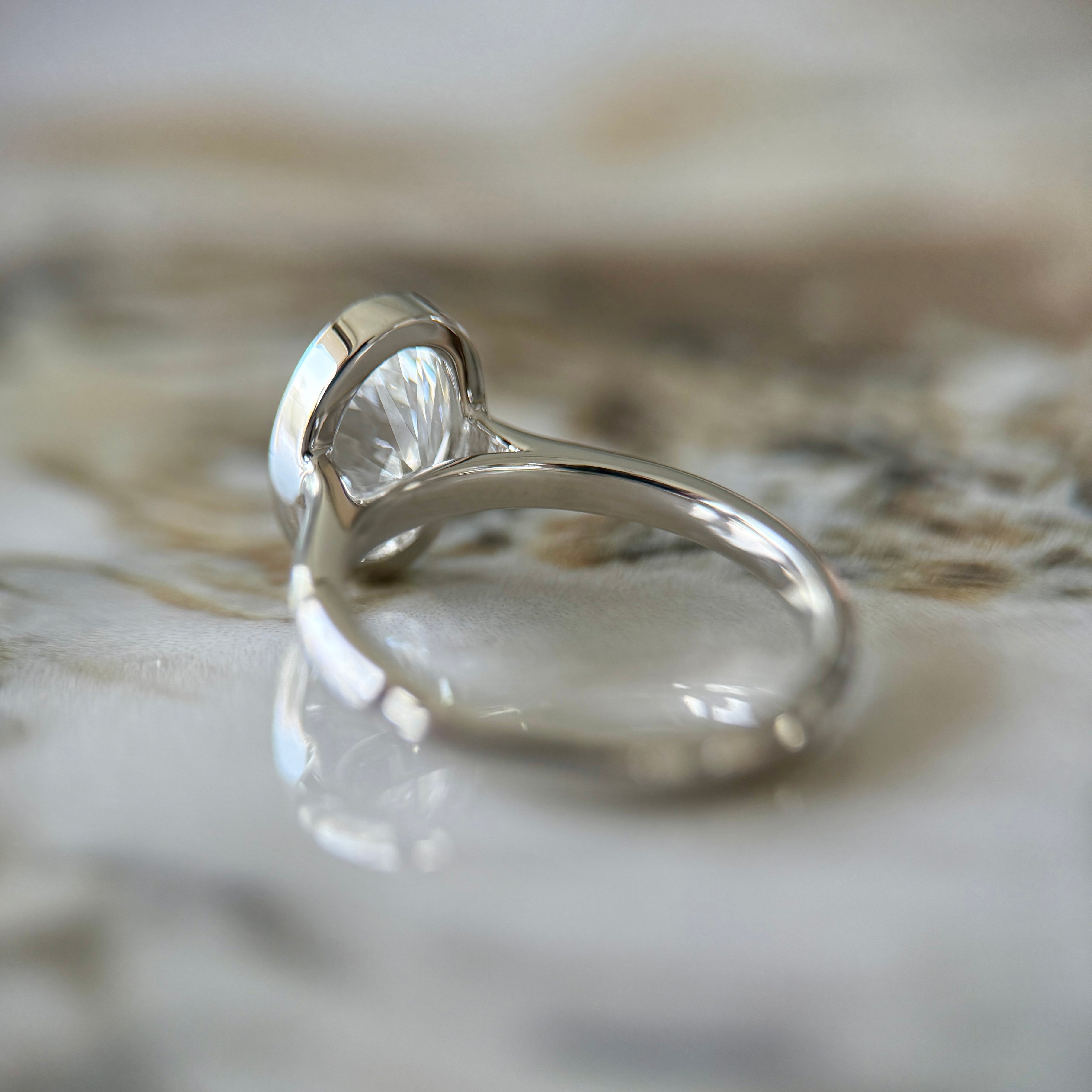 Bezel Set Classic Oval Cut Solitaire - 2ct+ (10mm+, D/E & VVS)