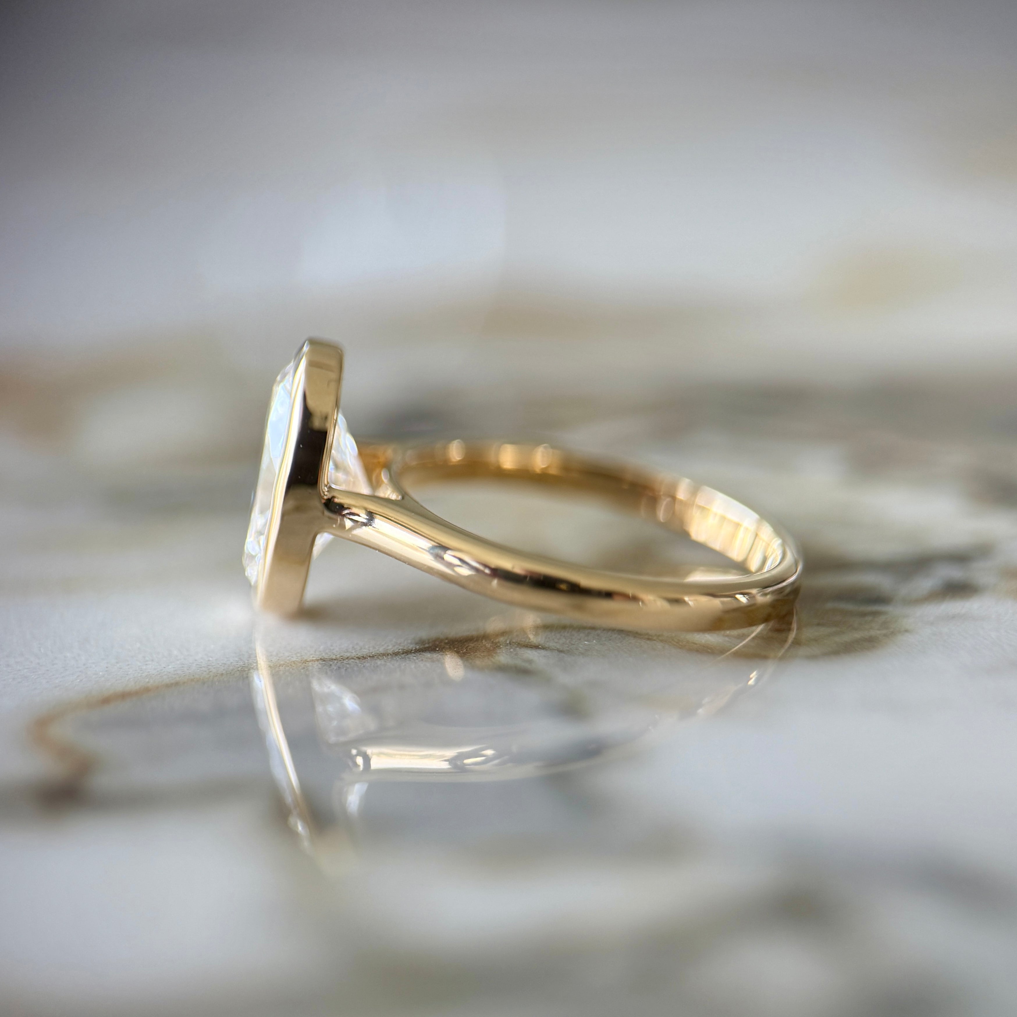 Bezel Set Classic Oval Cut Solitaire - 2ct+ (10mm+, D/E & VVS)