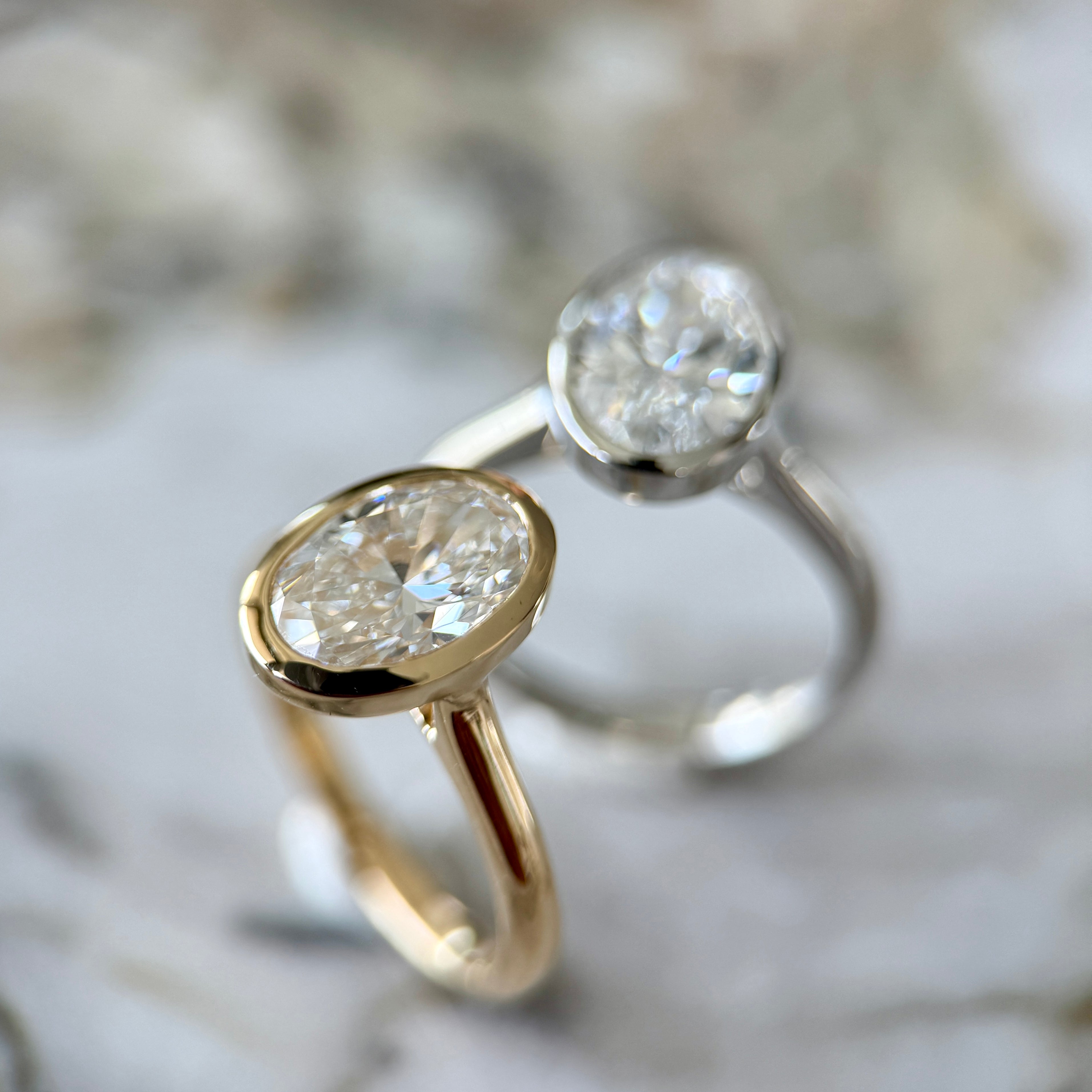 Bezel Set Classic Oval Cut Solitaire - 2ct+ (10mm+, D/E & VVS)