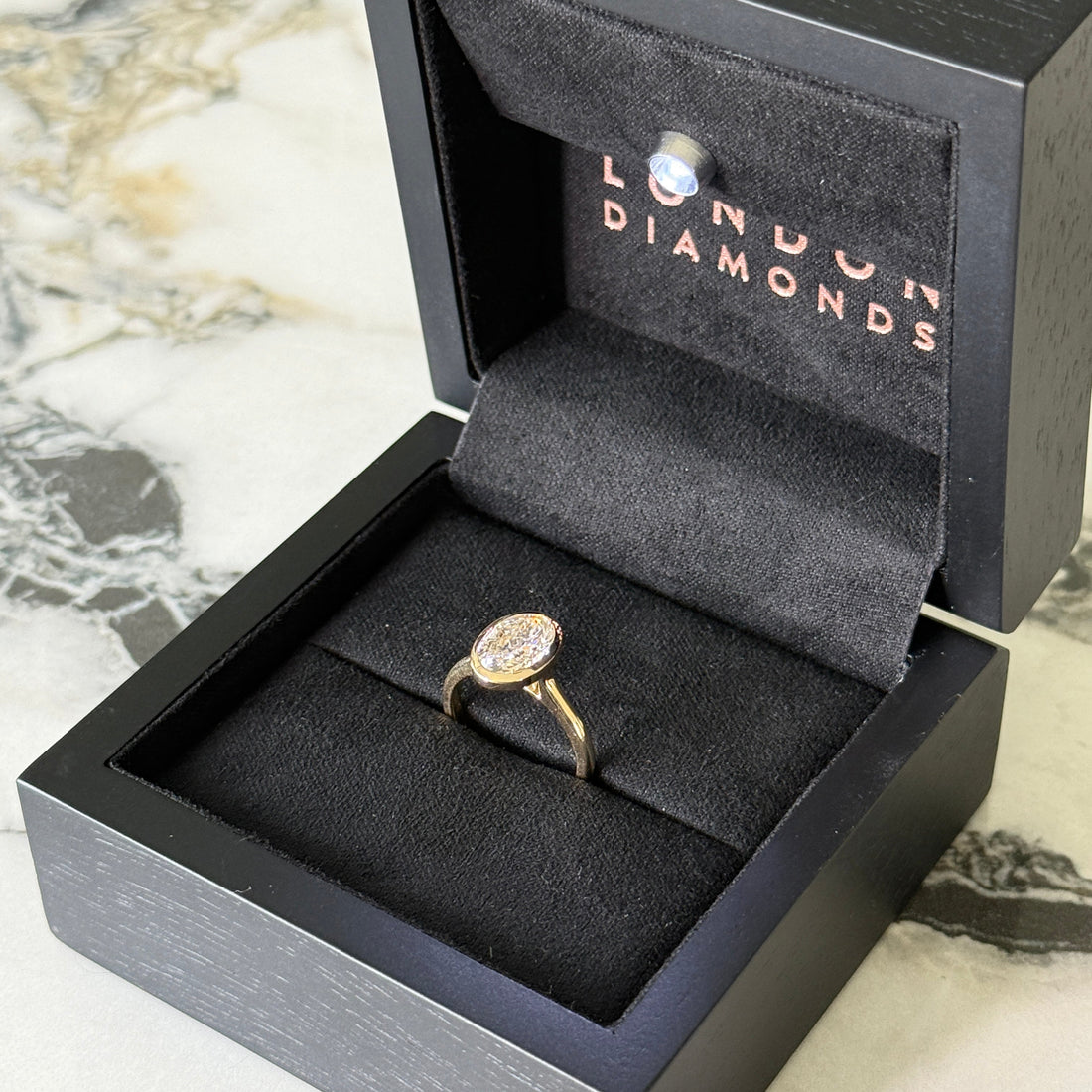 Bezel Set Classic Oval Cut Solitaire - 2ct+ (10mm+, D/E & VVS)