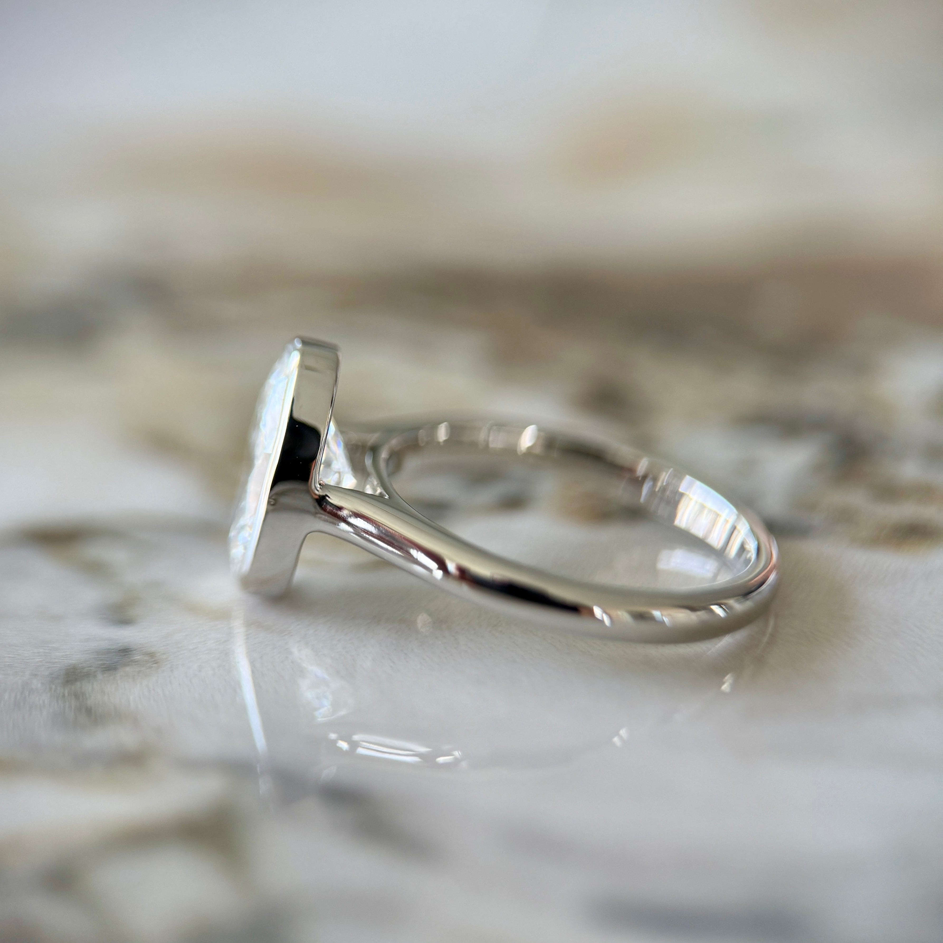 Bezel Set Classic Oval Cut Solitaire - 2ct+ (10mm+, D/E & VVS)