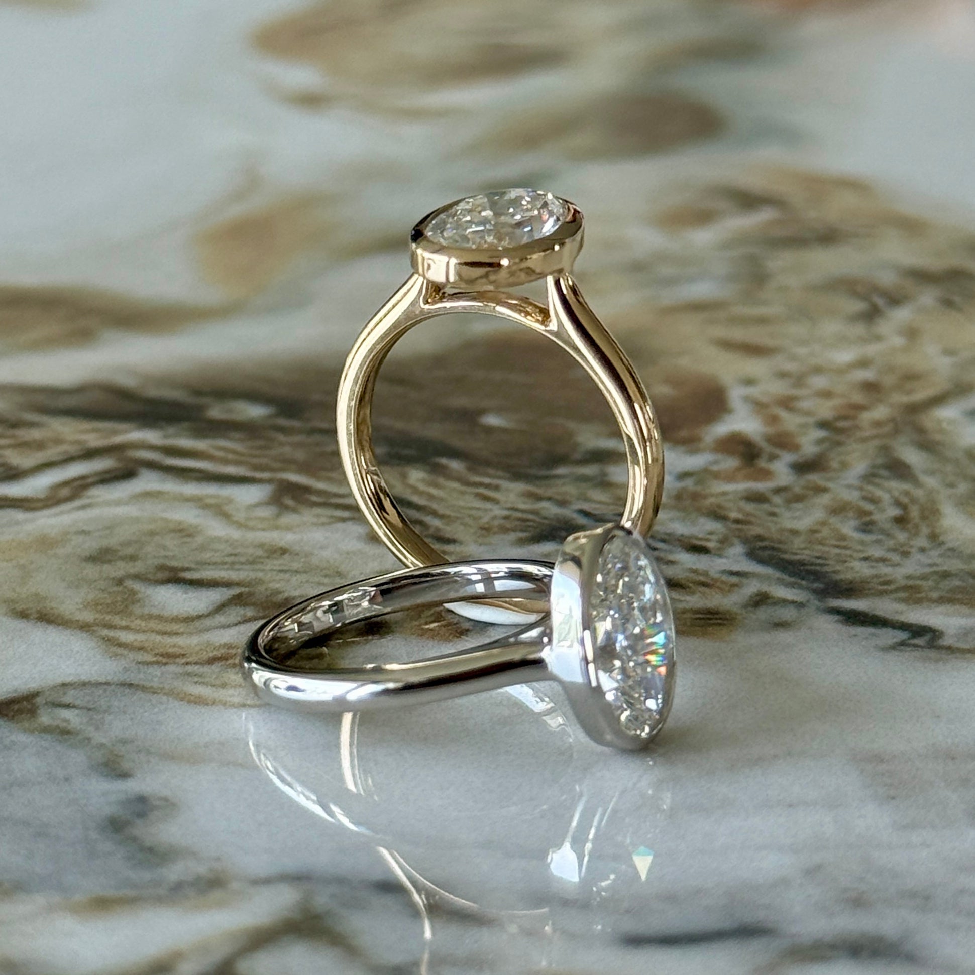 Bezel Set Classic Oval Cut Solitaire - 2ct+ (10mm+, D/E & VVS)