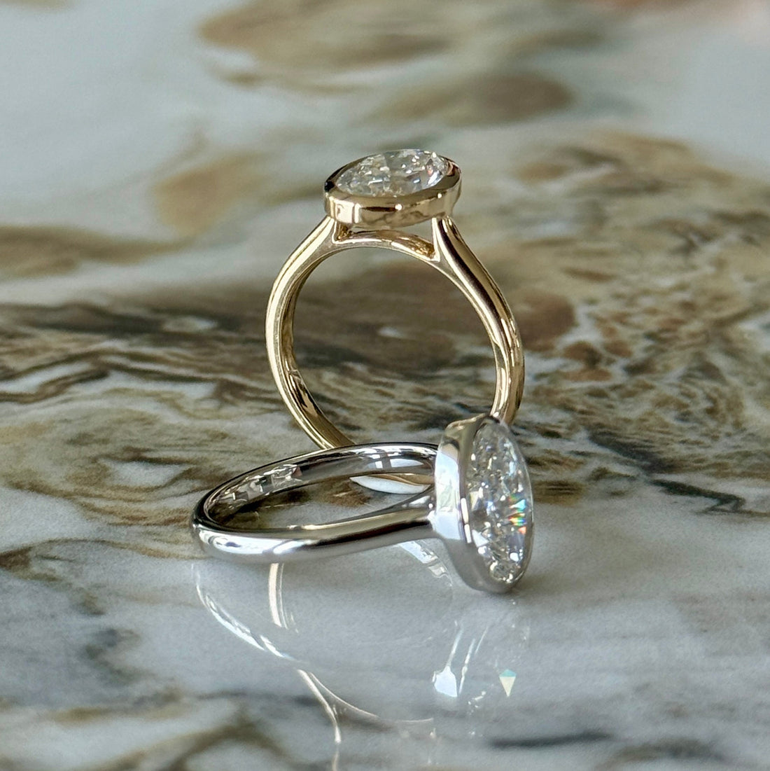 Bezel Set Classic Oval Cut Solitaire - 2ct+ (10mm+, D/E & VVS)