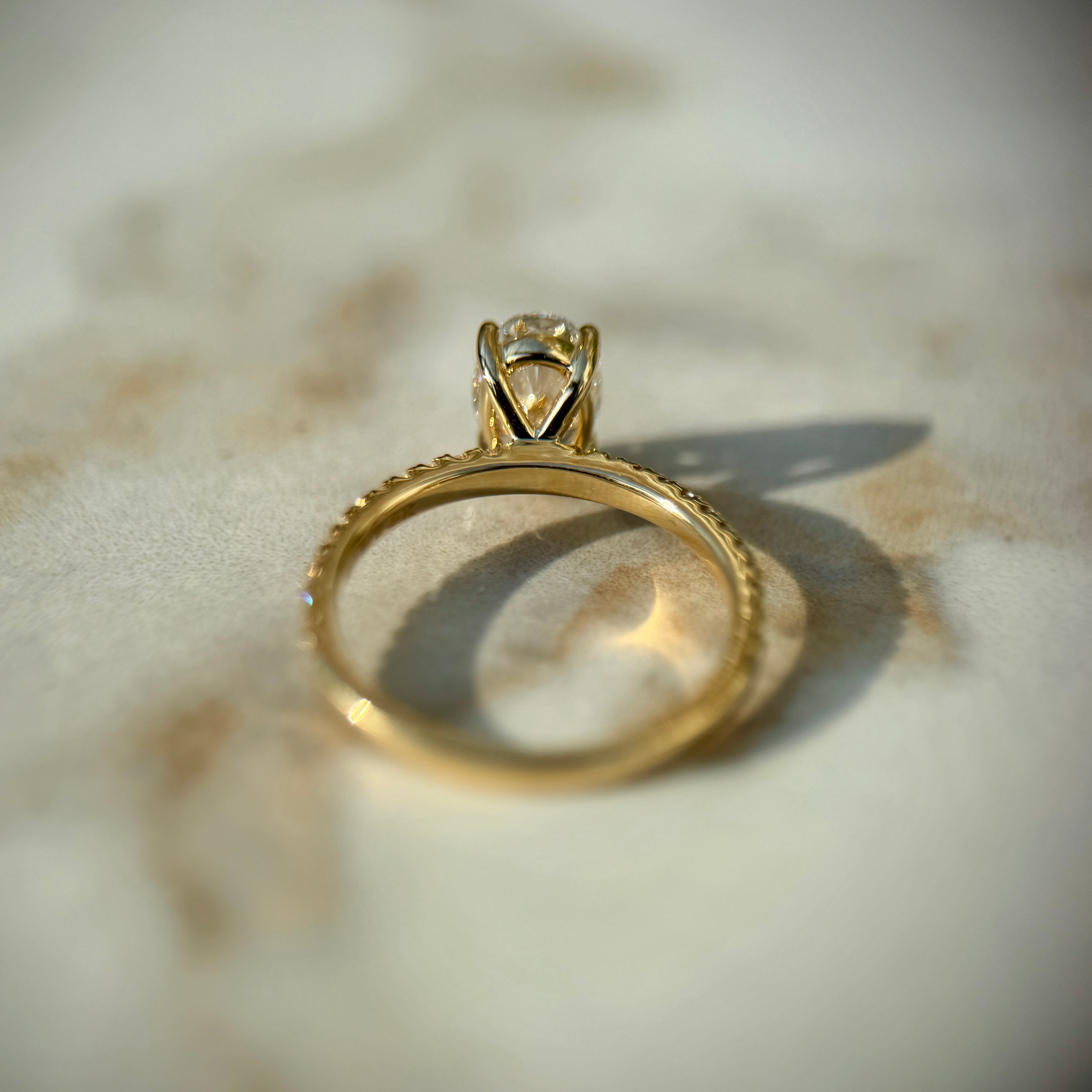 Classic Oval Cut Solitaire with Diamond Band - 1ct+ (8mm+, D/E & VVS)