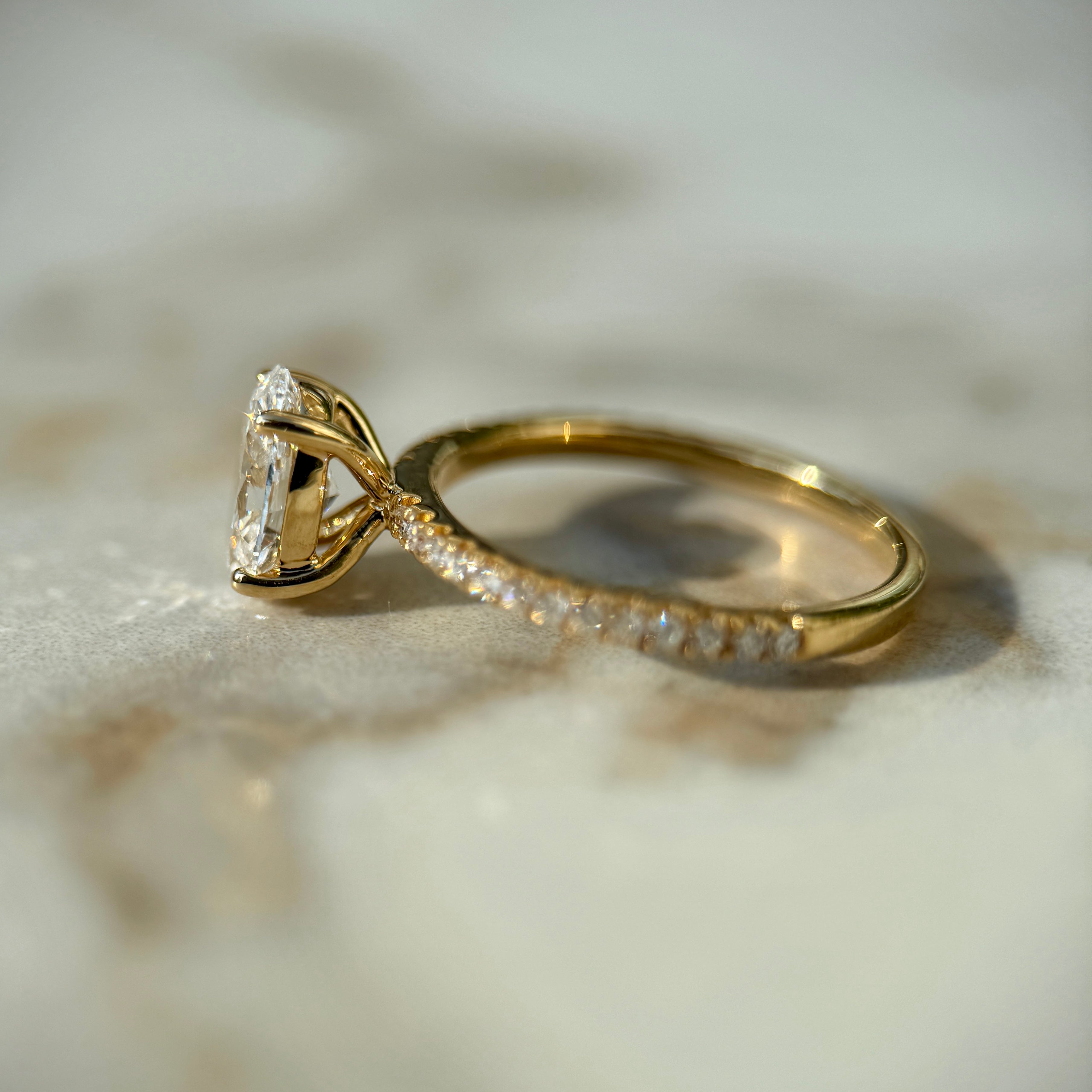 Classic Oval Cut Solitaire with Diamond Band - 1ct+ (8mm+, D/E & VVS)