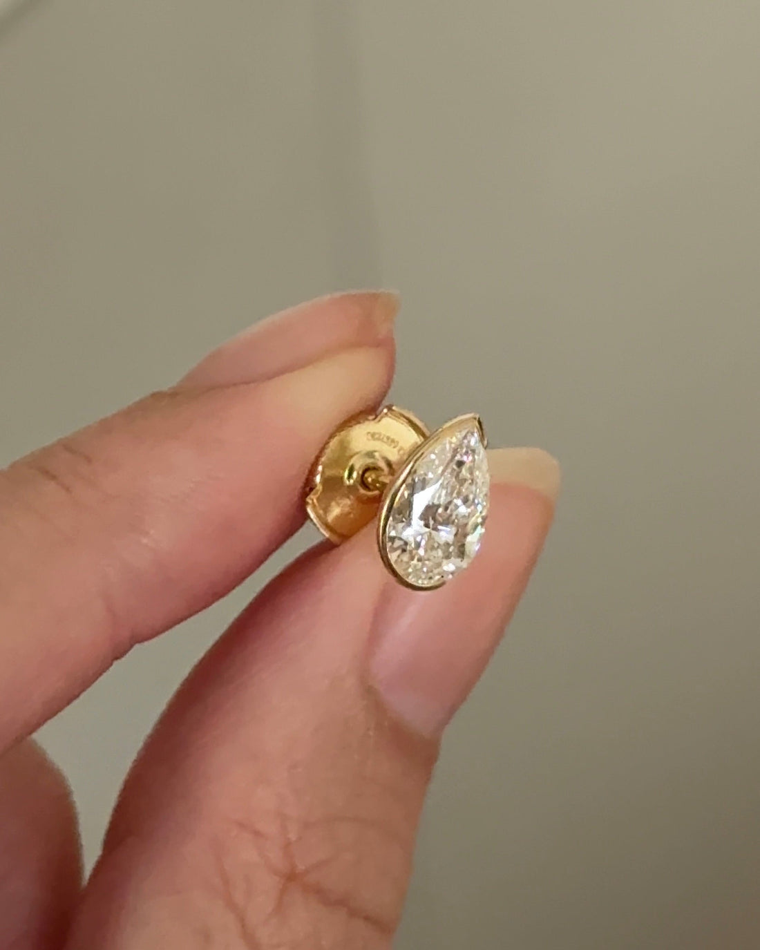 1 Carat Pear Diamond Stud Earrings in Bezel Arc Setting (with Comfort Fit Backing)