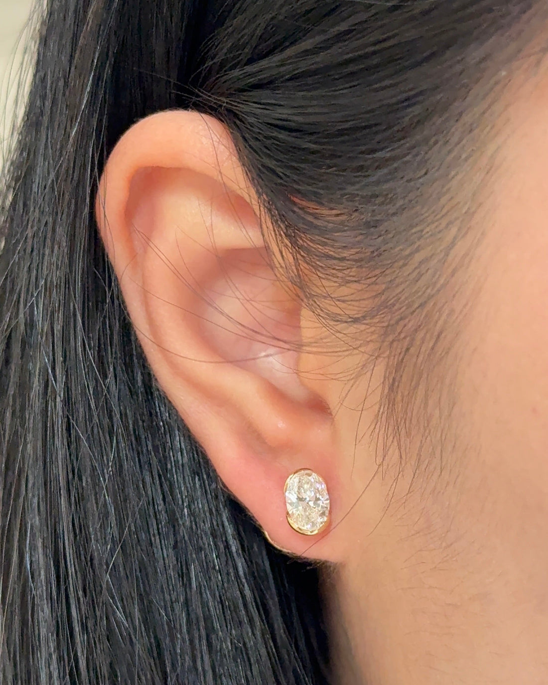1 Carat Oval Diamond Stud Earrings in Bezel Arc Setting (with Comfort Fit Backing)
