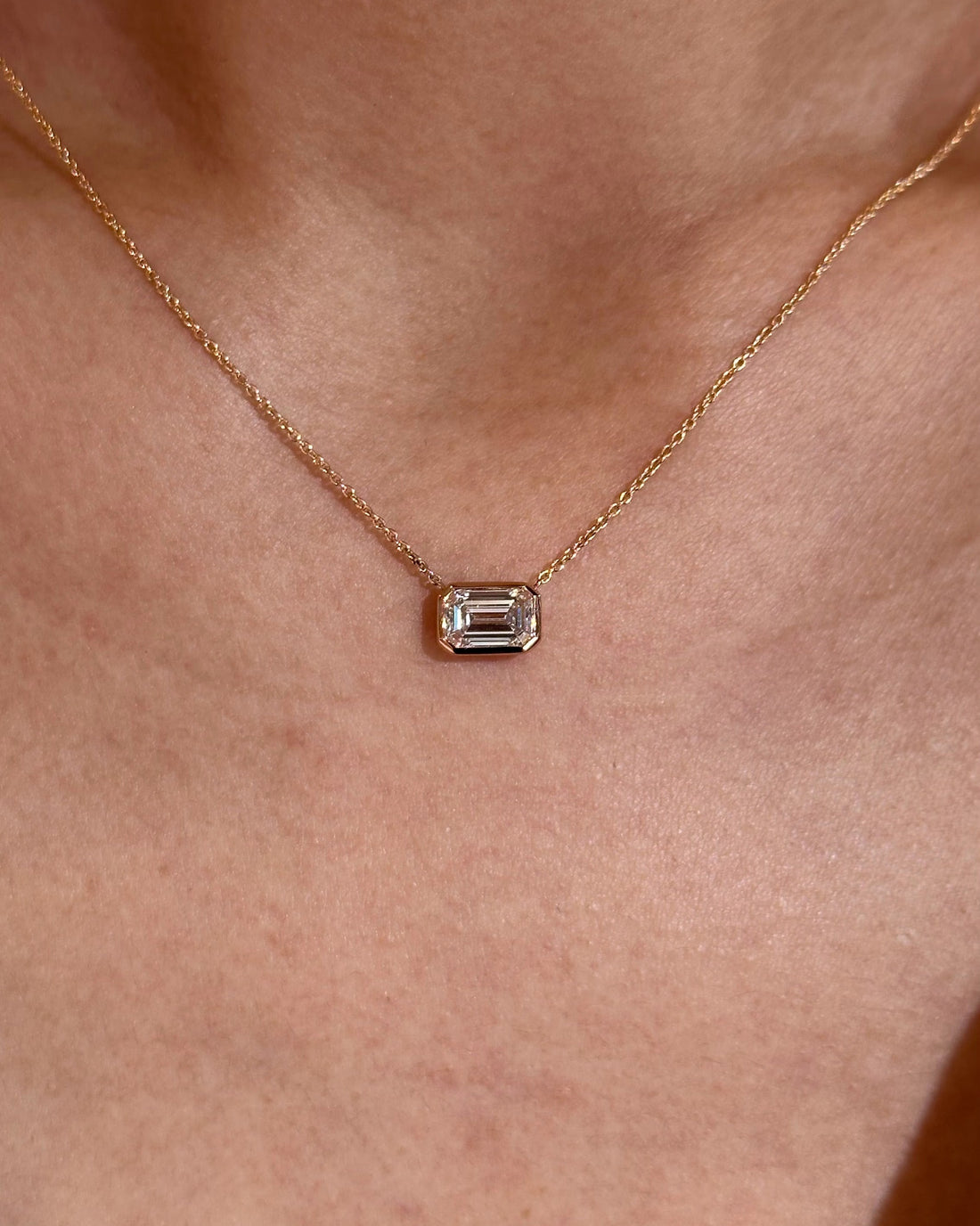 1 carat Emerald cut Diamond Pendant Necklace in Bezel setting